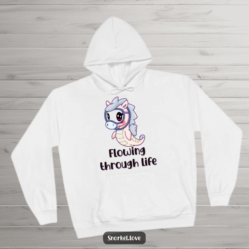 Funny cheerful seahorse wearing a snorkel, gracefully swimming, depicted on a soft, warm hoodie for cozy relaxation and humor.